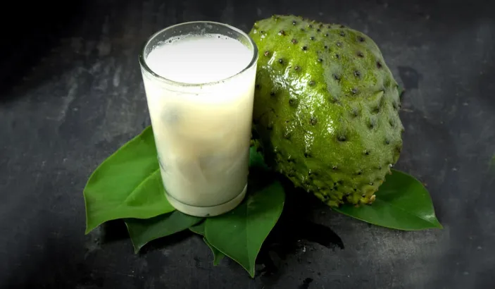 Soursop with a glass of sursop nectar